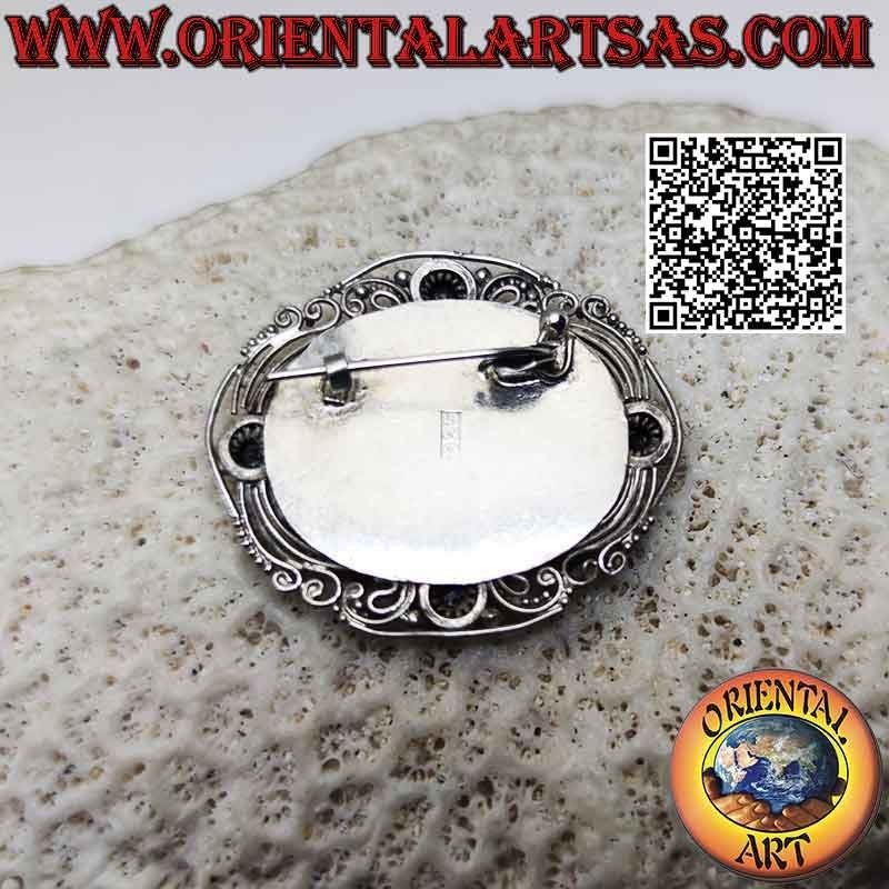 Big flower brooch in 925 ‰ silver with central oval natural garnet and detailed handmade decorations