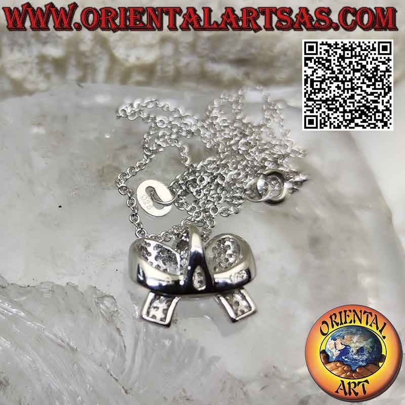 Silver bow pendant studded with zircons complete with 45 cm chain