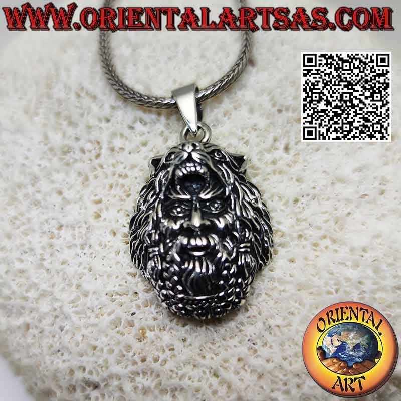 Silver pendant in the shape of the head of Odin (main Norse god) with wolf on his head