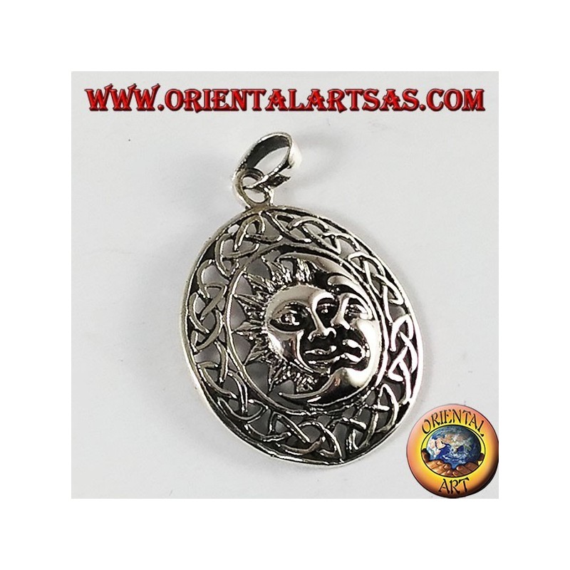 pendentif en argent, le soleil et la lune dans la roue celtique