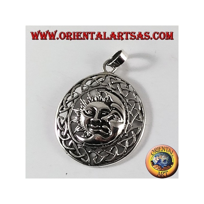 silver pendant, sun and moon in the Celtic wheel