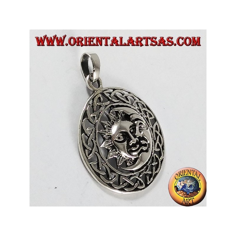silver pendant, sun and moon in the Celtic wheel