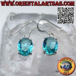 Boucles d'oreilles en argent avec topaze ovale à facettes sertie dans un double cadre lisse