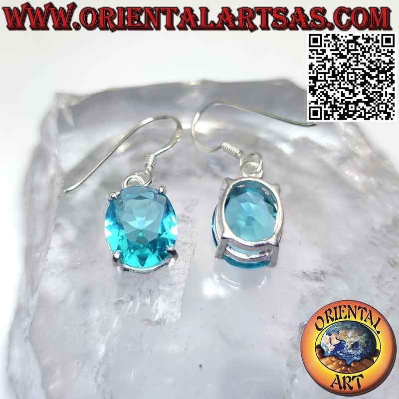 Boucles d'oreilles en argent avec topaze ovale à facettes sertie dans un double cadre lisse