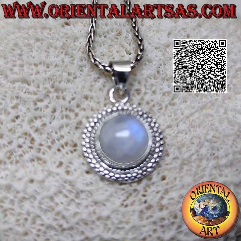Silver pendant with round cabochon rainbow moonstone surrounded by a double row of alternating microspheres