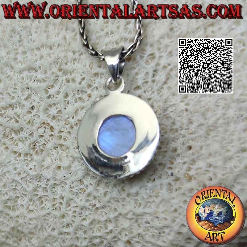 Silver pendant with round cabochon rainbow moonstone surrounded by a double row of alternating microspheres