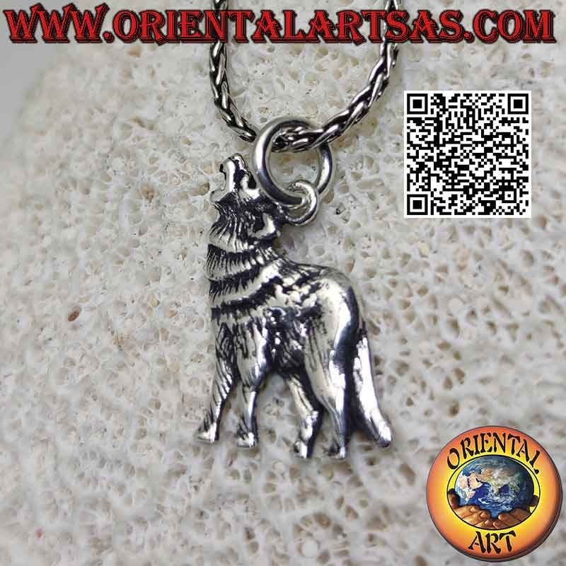 Silver pendant in the shape of a wolf howling (profile)