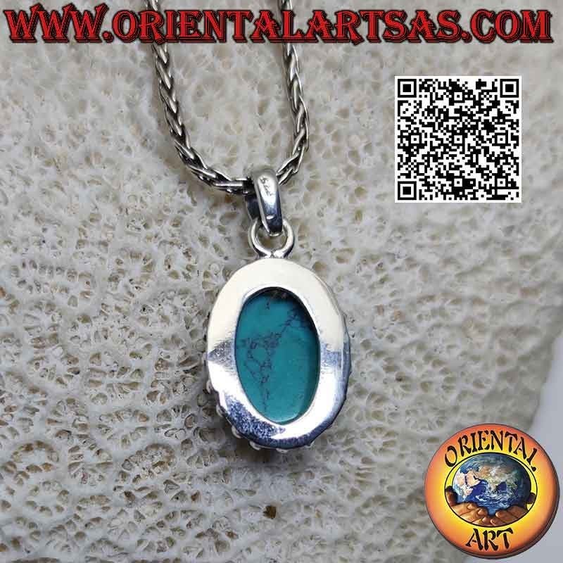 Pendentif en argent avec cabochon ovale turquoise entouré de boules cloutées entrelacées et lisses