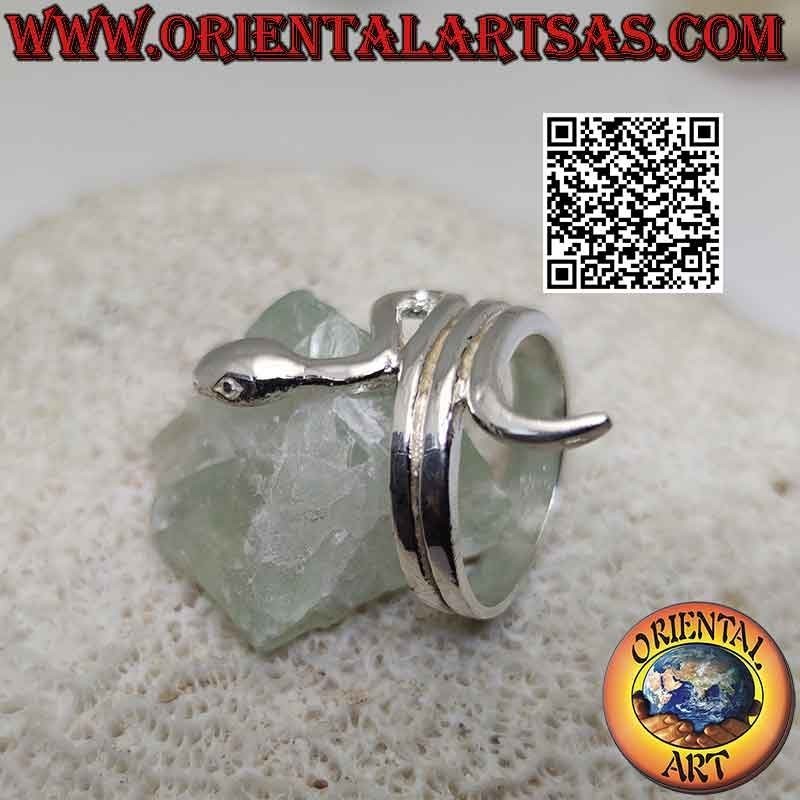Silver ring in the shape of a smooth snake in sinuous movement (three turns)