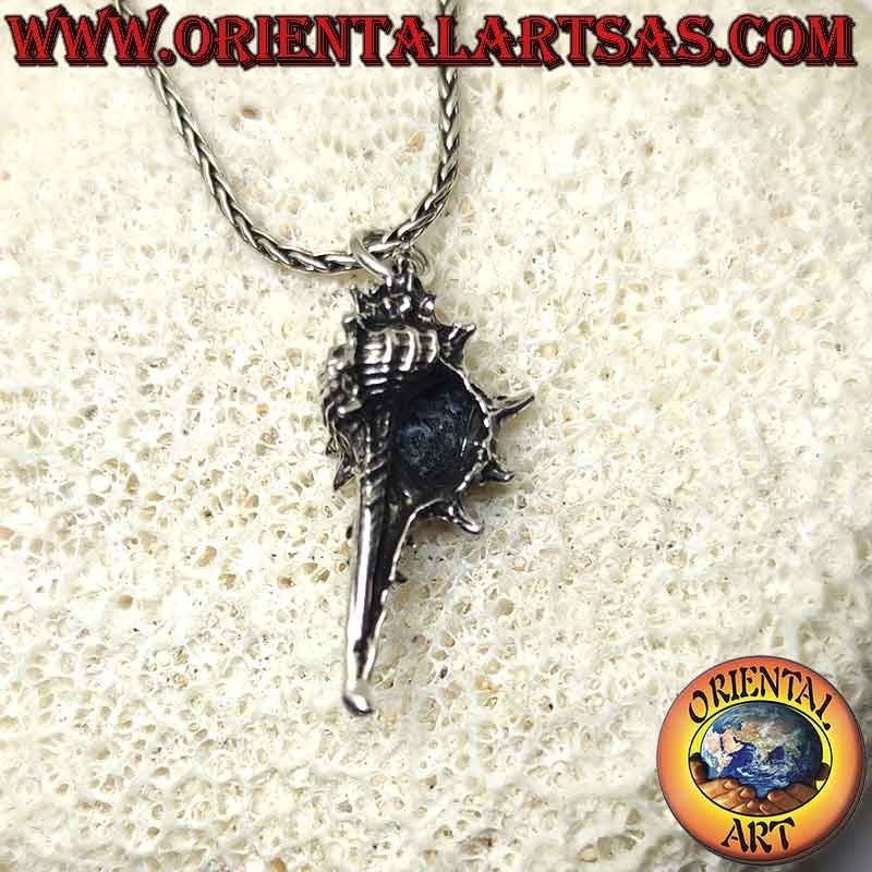 Silver pendant in the shape of a shell the tofa (musical instrument and symbol of fertility)