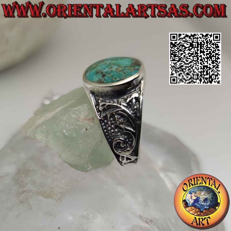 Anello in argento con turchese naturale dell'Arizona ovale e decoro floreale sui lati
