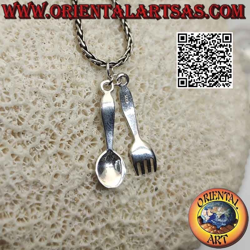 Smooth silver pendant, spoon and fork