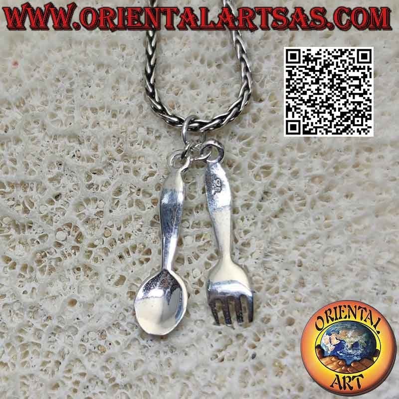 Smooth silver pendant, spoon and fork