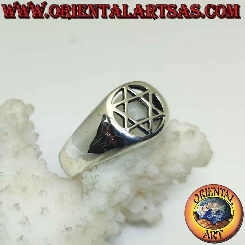 Silver ring with star of David (6-pointed star) in the perforated circle on a smooth setting
