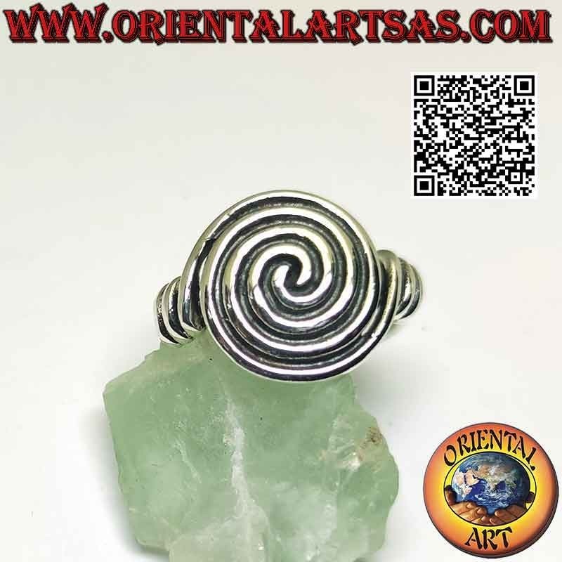 Silver ring with dense rounded spiral attached laterally