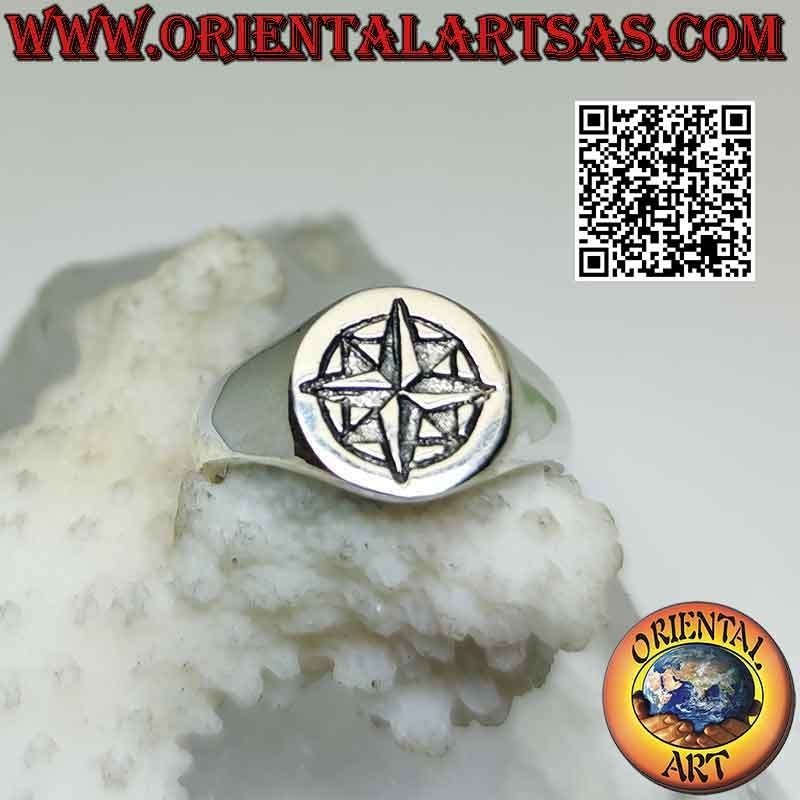 Smooth round silver ring with engraved "essential" wind rose