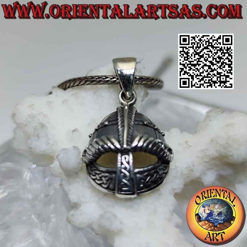 Silver pendant in the shape of a helmet with Celtic engravings