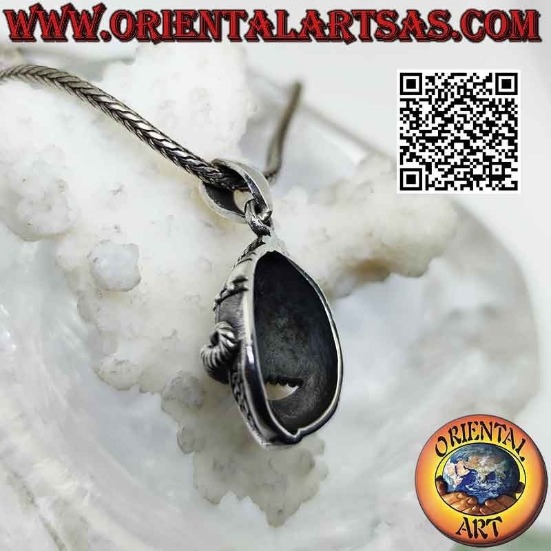 Silver pendant in the shape of a helmet with Celtic engravings