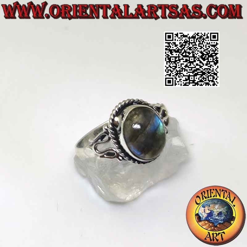 Silver ring with oval labradorite and serpentine on the sides
