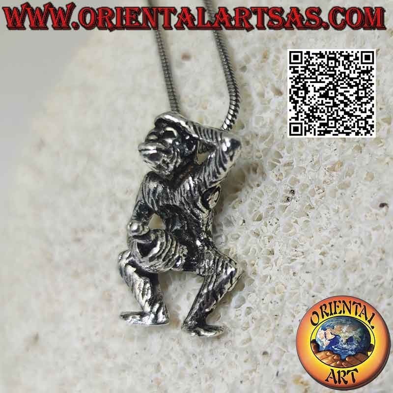 Pendentif en argent, le singe qui se masturbe en bougeant son bras
