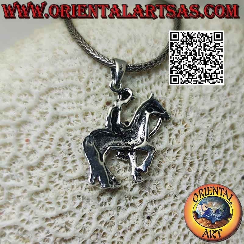 Colgante de plata con forma de vaquero a caballo (perfil)
