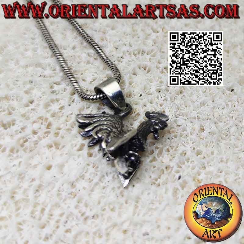 Silver pendant in the shape of a walking rooster (three-dimensional)