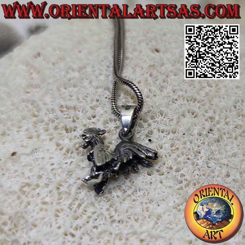 Silver pendant in the shape of a walking rooster (three-dimensional)