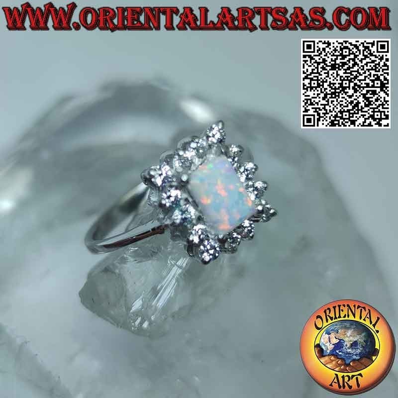 Silver ring with rectangular harlequin opal and white zircons