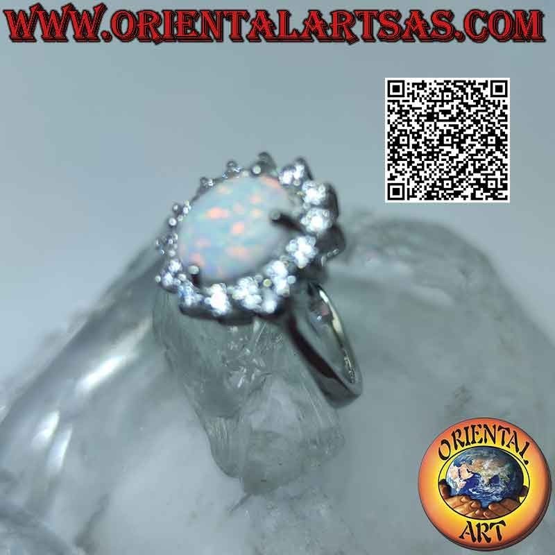 Bague en argent avec opale arlequin ovale entourée de zircons