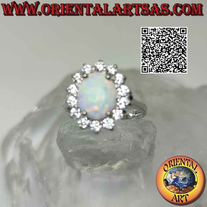 Bague en argent avec opale arlequin ovale entourée de zircons