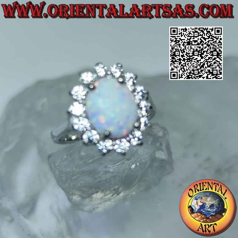 Bague en argent avec opale arlequin ovale entourée de zircons