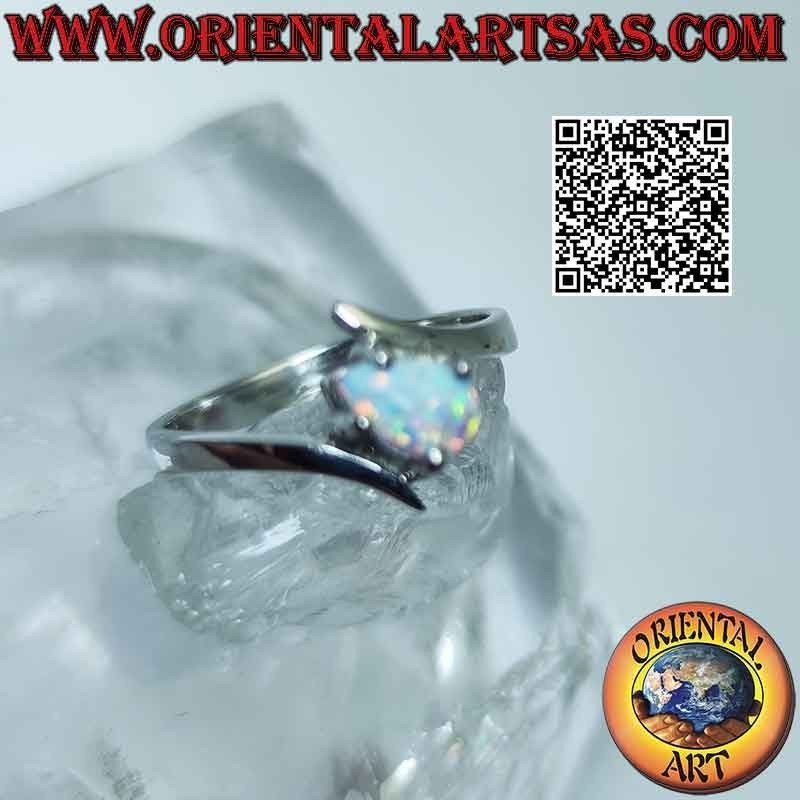 Silver ring with harlequin opal with cross drop