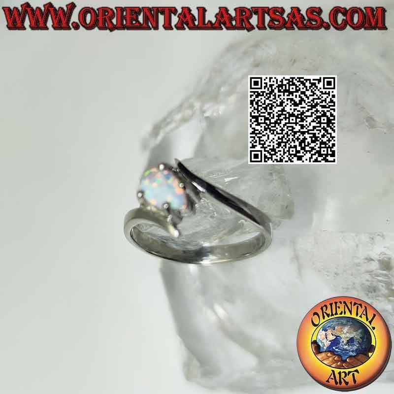 Silver ring with teardrop harlequin opal set crosswise between smooth lines