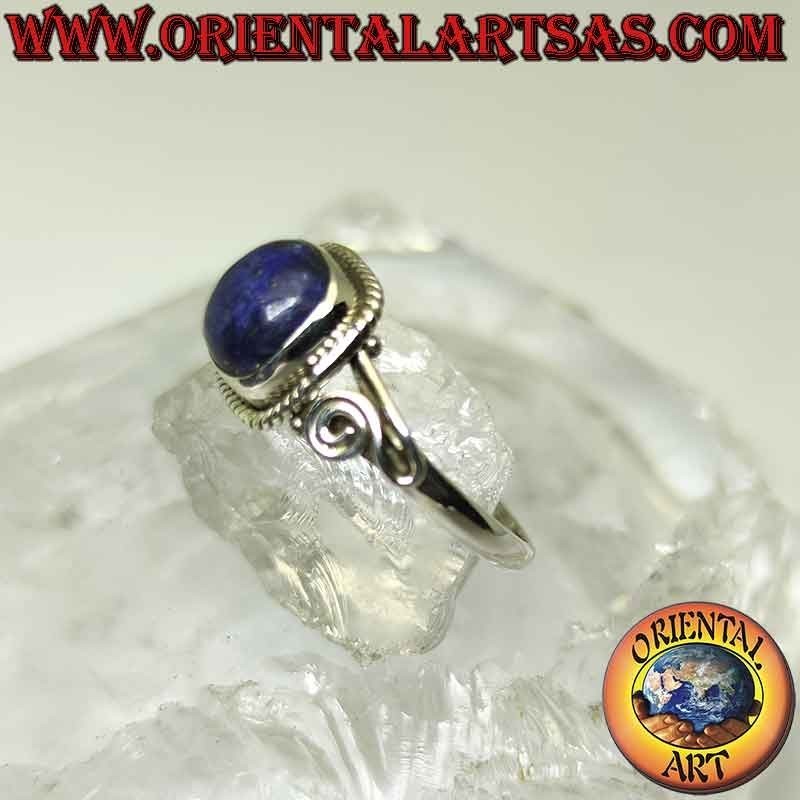 Ring in silver and lapis lazuli surrounded by asymmetrical interweaving and spiral