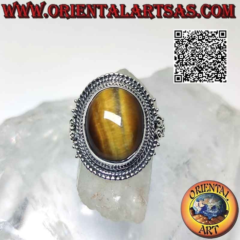 Silver ring with large oval cabochon tiger eye surrounded by microspheres and intertwining (adjustable)