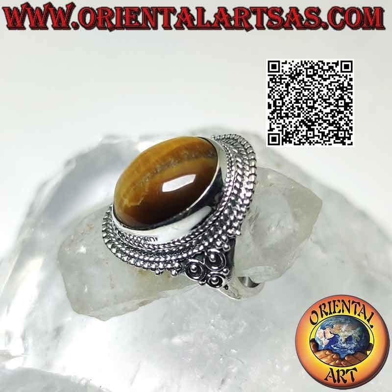 Silver ring with large tiger eye and microspheres decoration