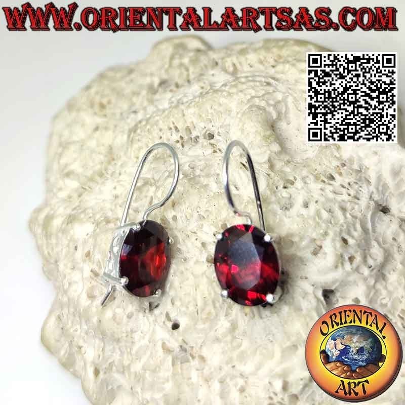 Silver earrings with faceted garnet and "S" cut-out