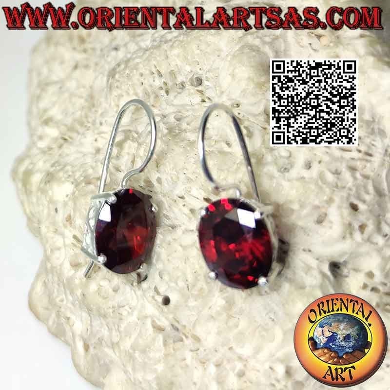 Silver earrings with faceted garnet and "S" cut-out