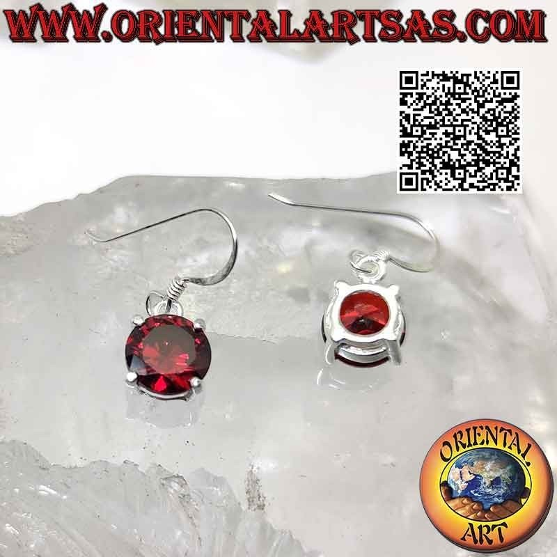 Silver earrings with round garnet on a smooth double frame