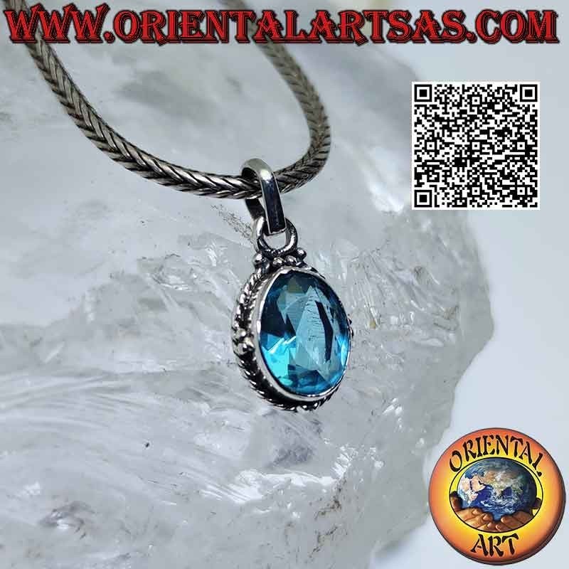 Silver pendant with faceted oval topaz, weave and balls