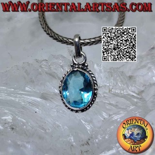 Pendentif en argent avec topaze bleue ovale facettée entourée d'entrelacs et boules aux points cardinaux