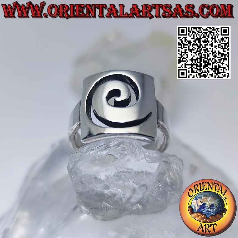 Smooth silver ring with spiral opening on a rectangular plate