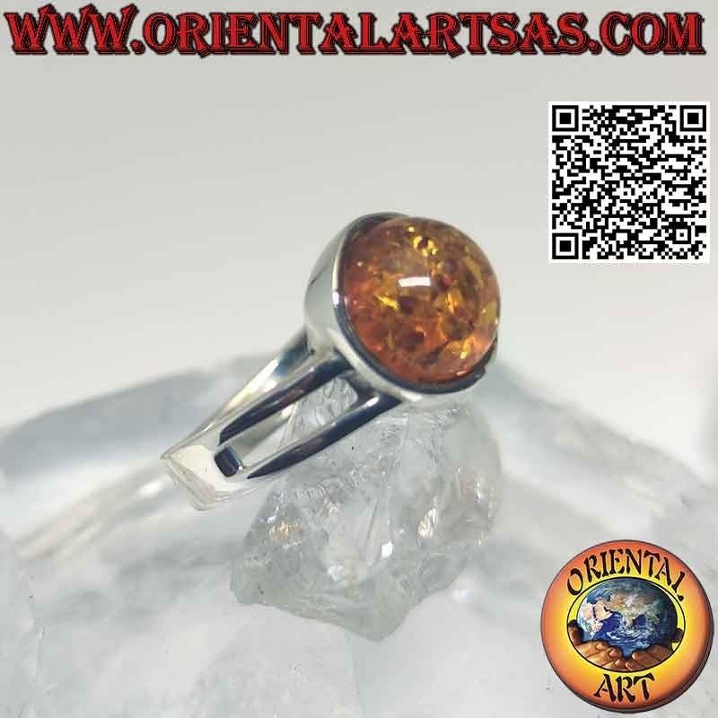 Anillo de plata con ámbar cabujón redondo y doble gancho asimétrico