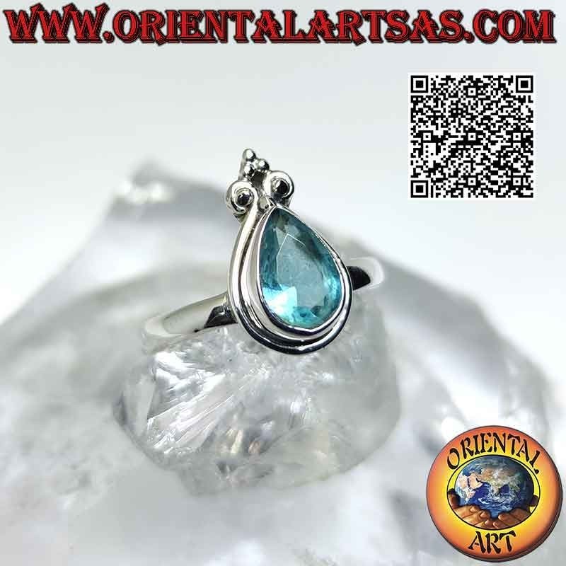 Silberring mit tropfenförmigem blauen Topas und Kronenlilie