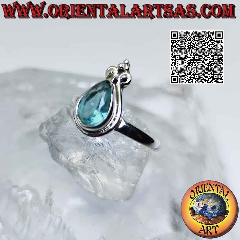 Silberring mit tropfenförmigem blauen Topas und Kronenlilie