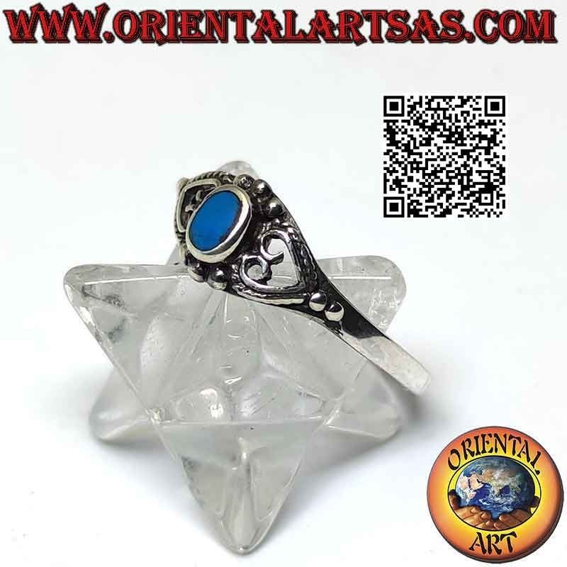 Silver ring with small oval turquoise between pierced heart