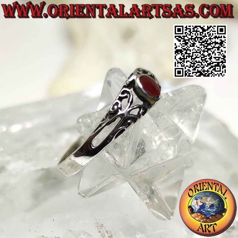 Silver ring with small oval carnelian and openwork decorations