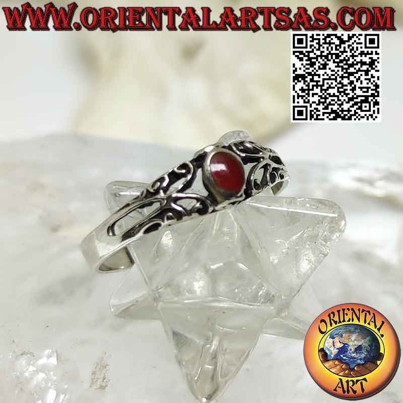 Silver ring with small oval carnelian and openwork decorations