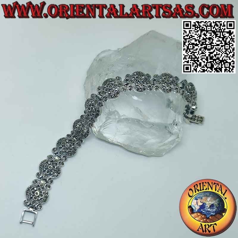 Pulsera en plata 925‰ con ondas con flor central y marcasita