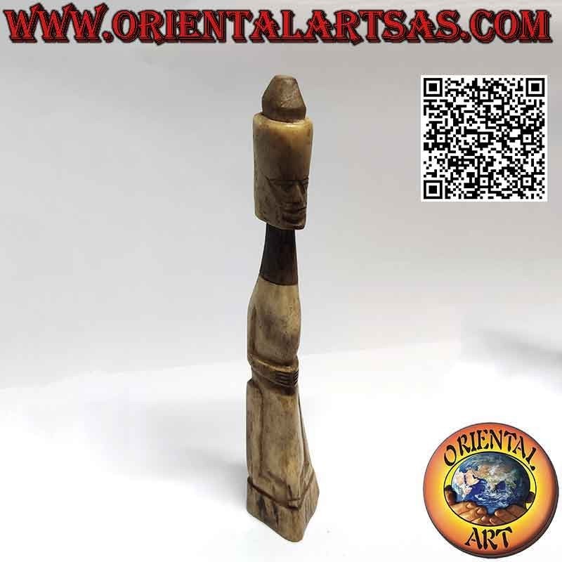 Primitive sculpture of a native with secret compartment in bone (25cm)